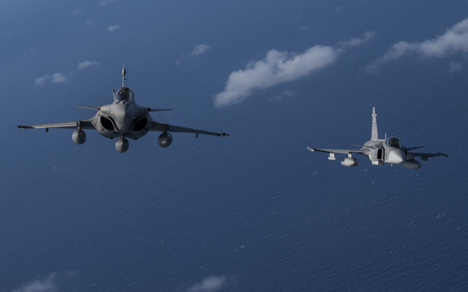 A-Rafale-and-a-Gripen-flying-in-formation.jpg